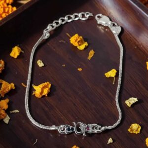 Rajyan jewellers 925 silver om chain rakhi with red & blue stone