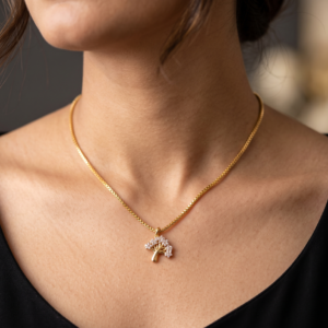 Detail view of the secure clasp and intricate 18-carat yellow gold