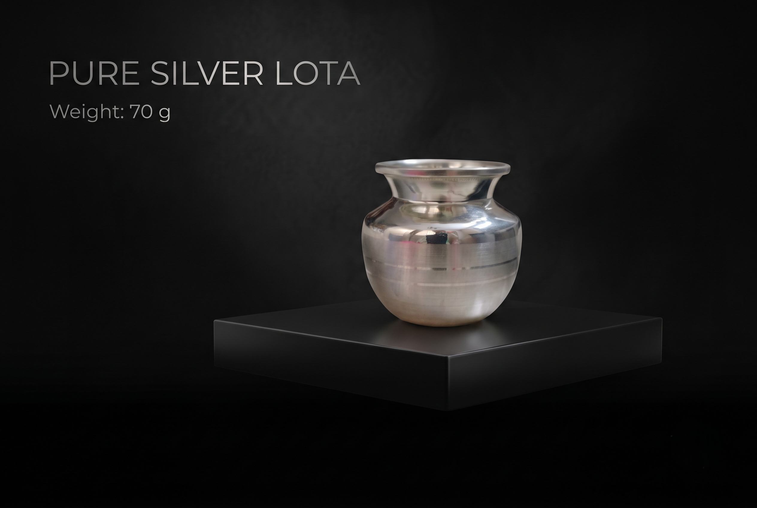 silver-lota-70gm Handcrafted 925 pure silver Lota (70 grams) with traditional horizontal banding, displayed on a luxury matte black pedestal